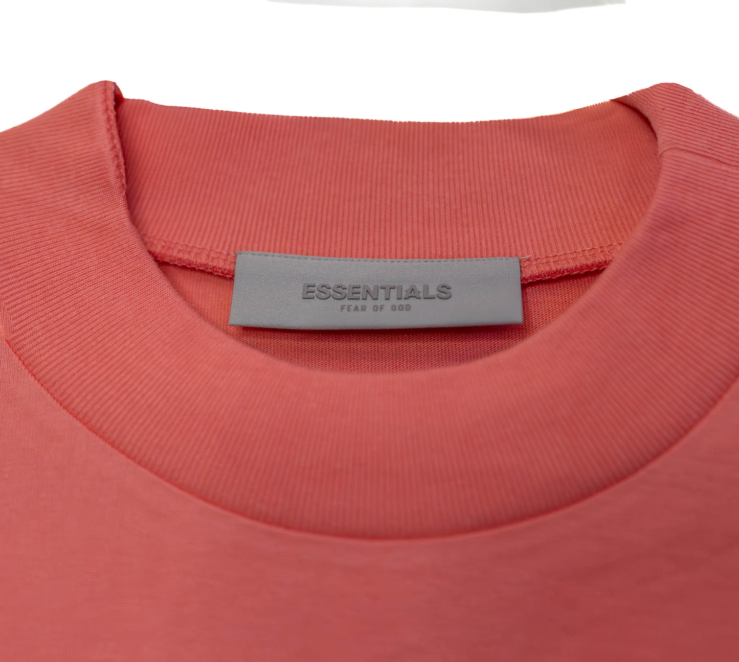 Fear of God Essentials Tee in the “Coral” Colorway