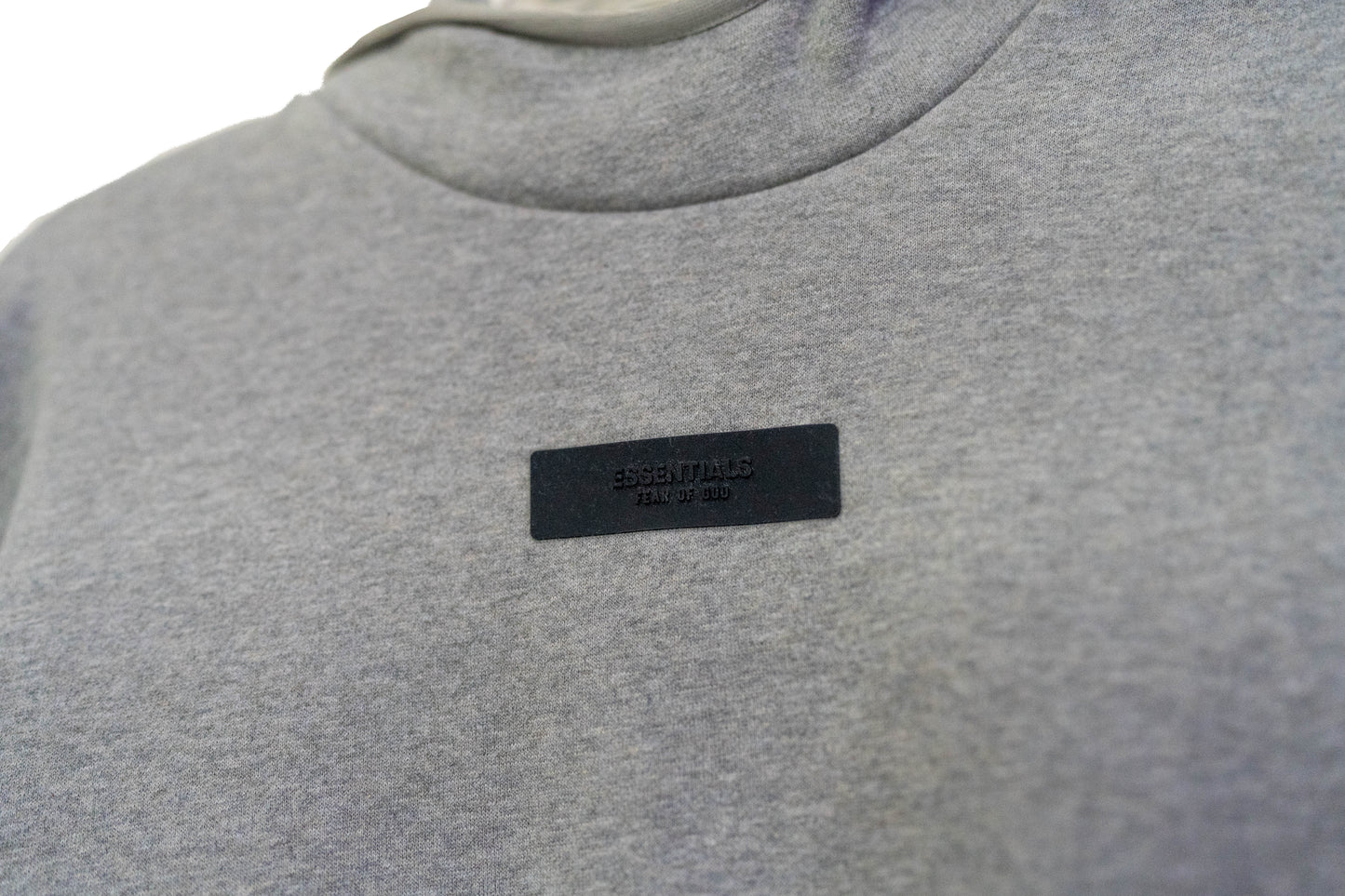 Fear of God Essentials Hoodie in the “Dark Heather” Colorway