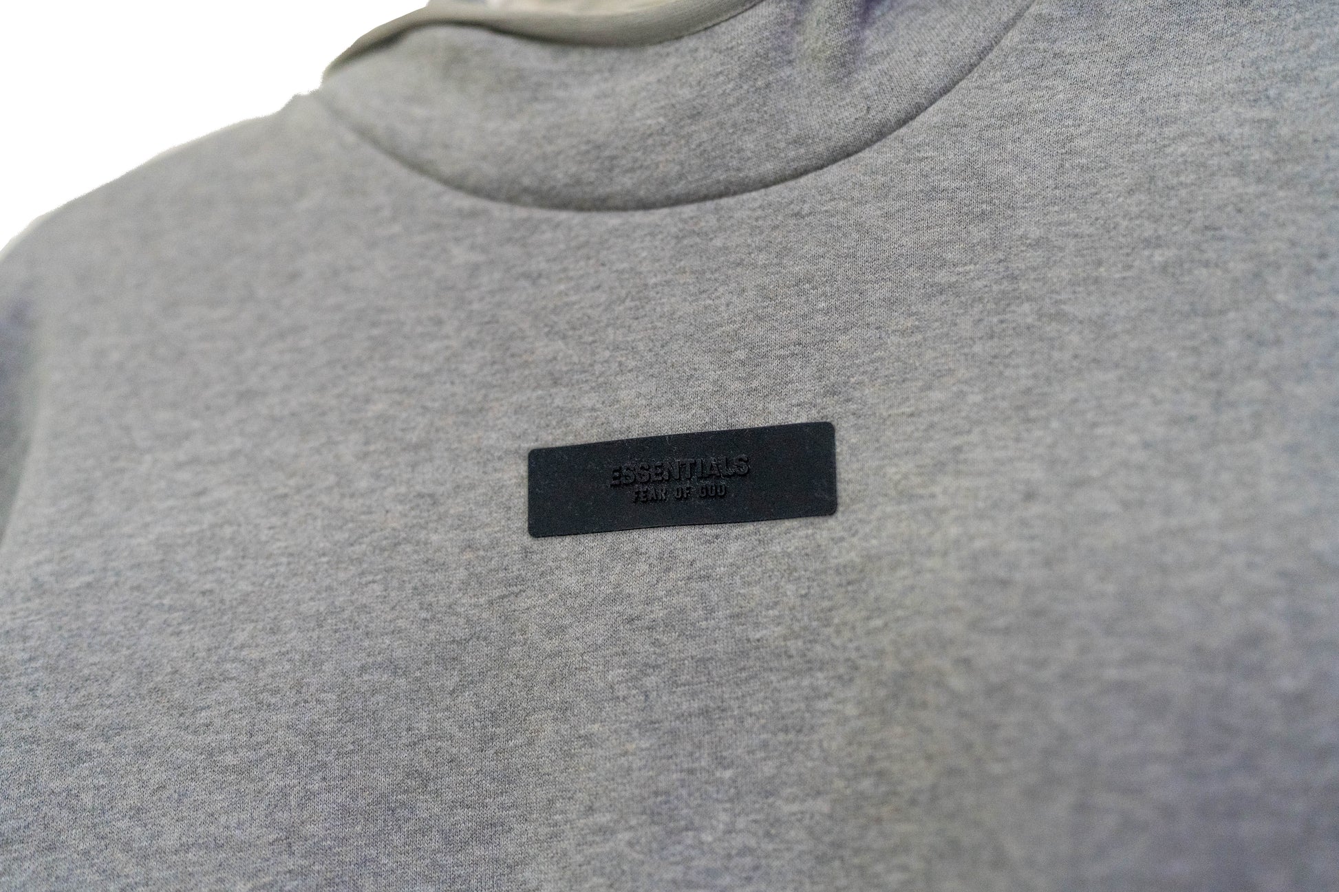 Fear of God Essentials Hoodie in the “Dark Heather” Colorway